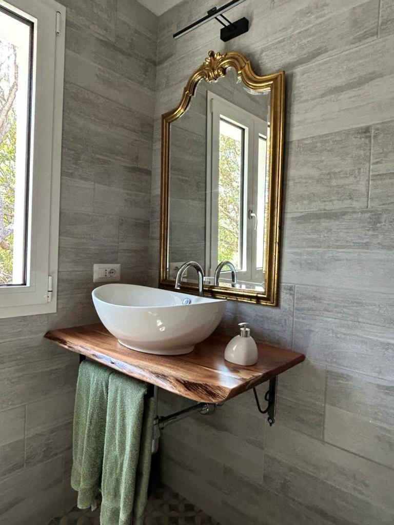 La Piana Holiday House Bassacutena Bagian luar foto