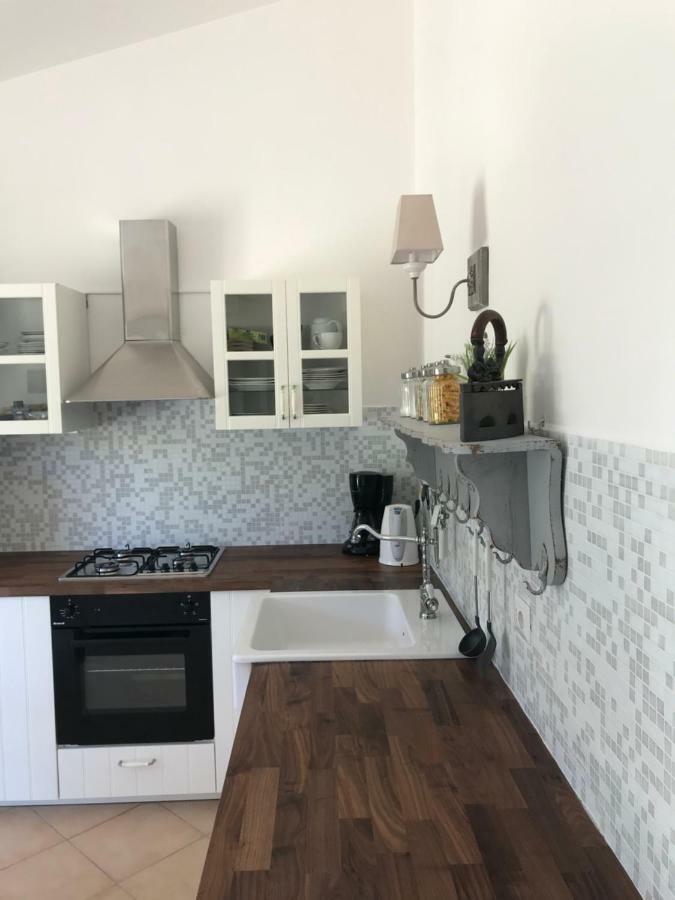 La Piana Holiday House Bassacutena Bagian luar foto