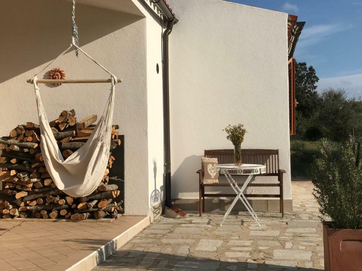 La Piana Holiday House Bassacutena Bagian luar foto